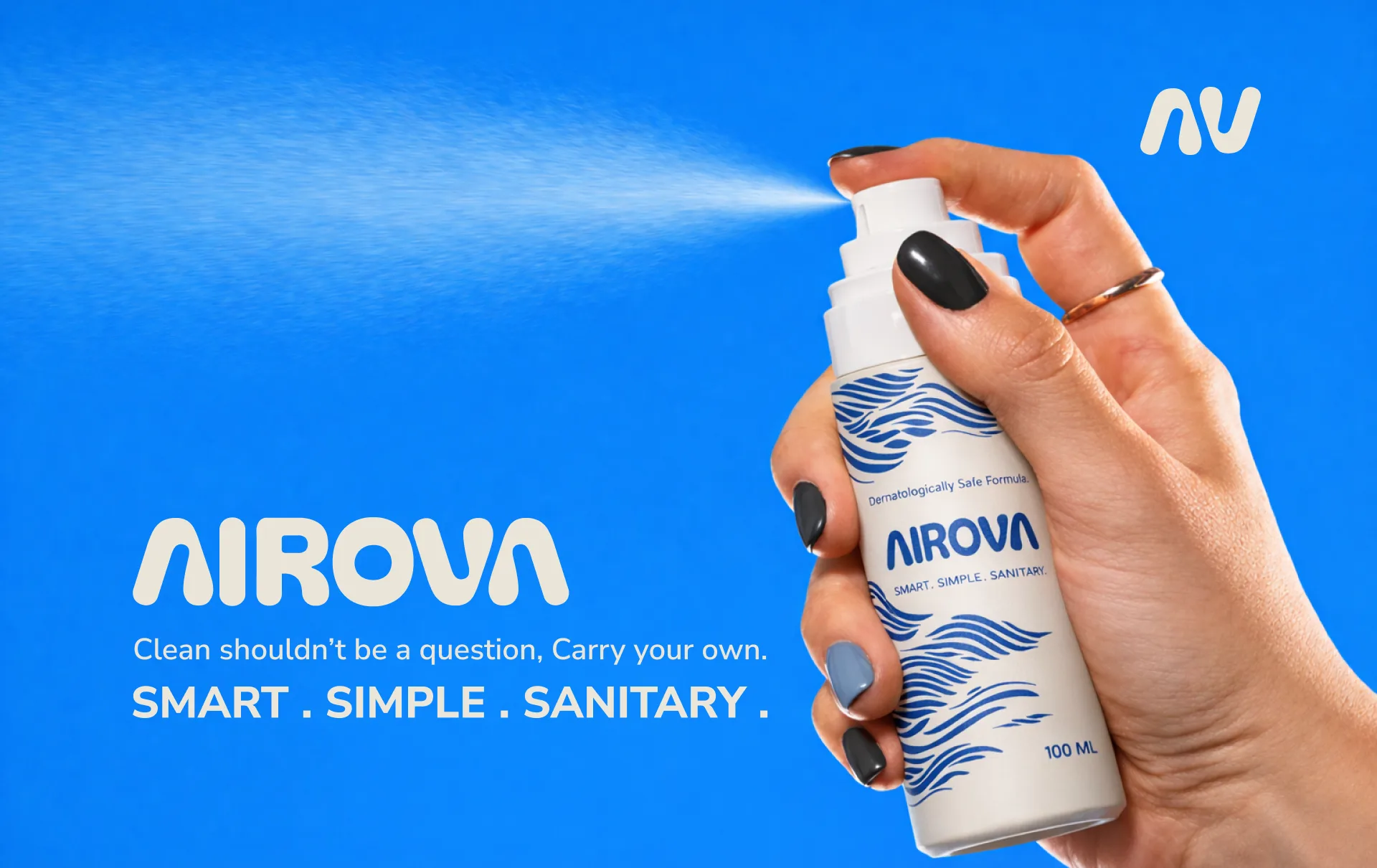 The key visual: a hand spraying the wave-patterned bottle, beside the line Clean shouldn't be a question, carry your own